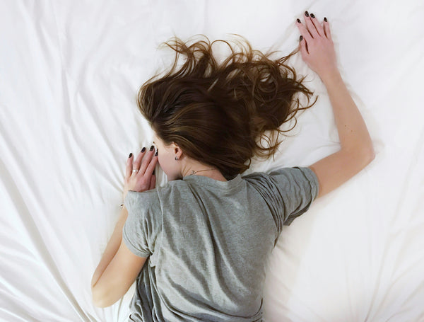 Why You Feel So Tired Before Your Period (And What to Do About It)